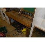 A HEAVY DUTY WORK BENCH, (approximate length 140cm) and a small vice (2)