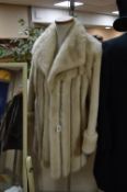 A CREAM FUR/SUEDE 3/4 BELTED JACKET, label 'Canadian Furs, Coventry'