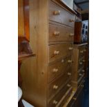 A MODERN TALL SLIM CHEST OF SIX DRAWERS