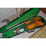 A CASED STUDENT'S VIOLIN, with two piece back, with a bow