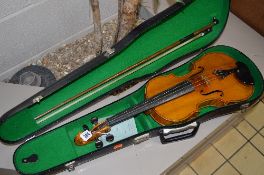 A CASED STUDENT'S VIOLIN, with two piece back, with a bow