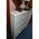 A MODERN PAINTED CHEST, of two short over three long drawers with a pierced fretwork panel above