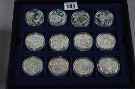 A CASED SET OF TWELVE SILVER COINS, a Celebration of Britain made for The 2012 London Games (