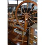 AN EARLY 20TH CENTURY PINE SPINNING WHEEL, Dryad, Leicester label attached