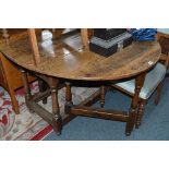 A GEORGIAN OAK OVAL GATE LEG TABLE, with a single drawer and four chairs, a Georgian oak carver