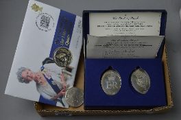 A QUEEN MOTHER FIRST DAY COVER, 102 silver Britannia £2 coin and two cased silver coins (4)