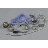 A MIXED LOT OF COSTUME JEWELLERY, including silver pendants, rings, etc