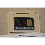 AN ELECTRONIC SAFE WITH KEY