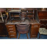 A MID 20TH CENTURY OAK ROLL TOP DESK, with brown tooled leather inlay top, fitted interior above