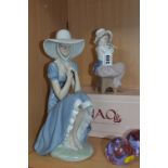 TWO NAO FIGURES, boxed 'A Big Hug' girl and dog No.01049 and larger figure of girl with straw hat (