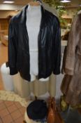 A BLACK OAKLEAF GENTS LEATHER JACKET, a brown leather jacket and a Windsmoor wool coat (3)
