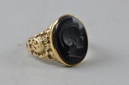 A GENTS INTAGLIO SIGNET RING, ring size Y, approximate weight 8.7 grams