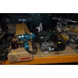 A BLACK AND DECKER ROUTER, a boxed Bosch 9.6v cordless drill, a boxed Makita 9mm filing sander and a