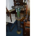 A TIFFANY STYLE TABLE LAMP, (missing top section) and a black marble jardiniere (2)
