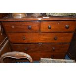 A VICTORIAN MAHOGANY CHEST, of two short and three long drawers, on turned feet, approximate size