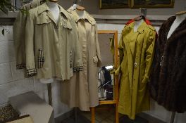 SIX VARIOUS LADIES AND GENTLEMENS RAINCOATS, JACKETS AND A GILET, to include yellow raincoat with