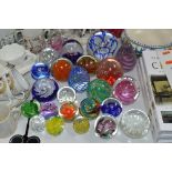 TWENTY FOUR VARIOUS GLASS PAPERWEIGHTS