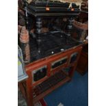 AN ORIENTAL SIDE TABLE, with an ornately carved lacquered and painted raised back and sides, the