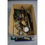 A BOX OF MISCELLANEOUS, to include silver pocket watch, fob watch, coins, pens, etc