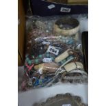 A BAG OF MIXED COSTUME JEWELLERY etc