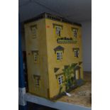 SCRATCH OR KIT BUILT WOODEN DOLLS HOUSE, modelled as a three storey town house, rear access to seven