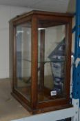 A TABLE TOP DISPLAY CASE, with single glass shelf