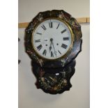 A 20TH CENTURY BLACK LACQUERED AND MOTHER OF PEARL WALL CLOCK, with painted floral detail, the