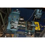 A EMCO MAXIMAT V10-P LATHE/MILLING MACHINE, with a toolbox and a tray of attachments and tools and a