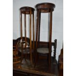 AN EDWARDIAN MAHOGANY AND INLAID PLANT STAND, and a similar plant stand (2)