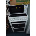 A ZANUSSI ELECTRIC COOKER, and a microwave (2)