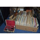 A CASED CONSOLE CLARINET, various other wind instruments, an Autoharp, bongos and two boxes of sheet