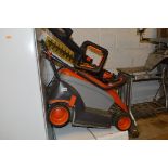 A FLYMO LAWN MOWER, and a Gardina electric hedge trimmer (2)