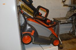 A FLYMO LAWN MOWER, and a Gardina electric hedge trimmer (2)