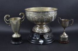 A LARGE PLATED ROSE BOWL, and two trophies