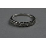 AN 18CT DIAMOND HALF ETERNITY RING, ring size N, approximate weight 2.2 grams