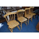 A SET OF FOUR MODERN BEECH KITCHEN CHAIRS