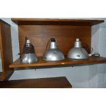 THREE SMALL INDUSTRIAL LIGHT FITTINGS, two fittings stamped Envoy 25cm diameter, the other 17cm