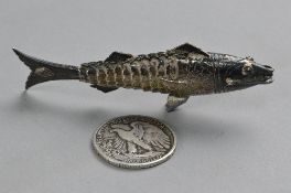 A SILVER ARTICULATED FISH, and half dollar coin