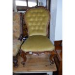 A VICTORIAN CARVED WALNUT BUTTON BACK CHAIR, and a pair of Victorian carved mahogany footstools with