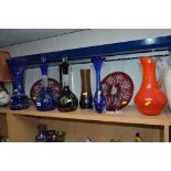 A GROUP OF COLOURED GLASS, to include two flashed, cut and wheel engraved decanters and a vase of