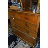 AN EDWARDIAN OAK AND WALNUT CHEST, of two short and three long drawers, approximate size width 107cm