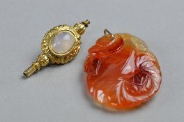A VICTORIAN HIGH CARAT GOLD WATCH KEY, together with a hardstone pendant (2)