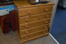 A PINE CHEST, of two short and four long drawers