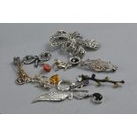 A BAG OF ASSORTED SILVER BROOCHES, and costume jewellery, etc