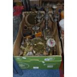 A BOX OF METALWARES, to include gong, candelabra, horse brasses etc
