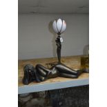 A DECO STYLE TABLE LAMP, shaped as lady holding vase, height approximately 34cm (not including
