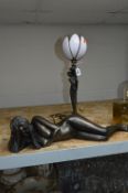 A DECO STYLE TABLE LAMP, shaped as lady holding vase, height approximately 34cm (not including