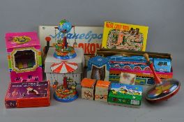 A COLLECTION OF BOXED AND UNBOXED TINPLATE CLOCKWORK TOYS, mainly of West German, Russian and