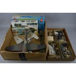 A QUANTITY OF BUILT PLASTIC CONSTRUCTION KITS, spare parts, part built kits, accessories etc, with a