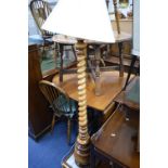 A MODERN MAHOGANY BARLEY TWIST STANDARD LAMP, on a square white marble base with a shade